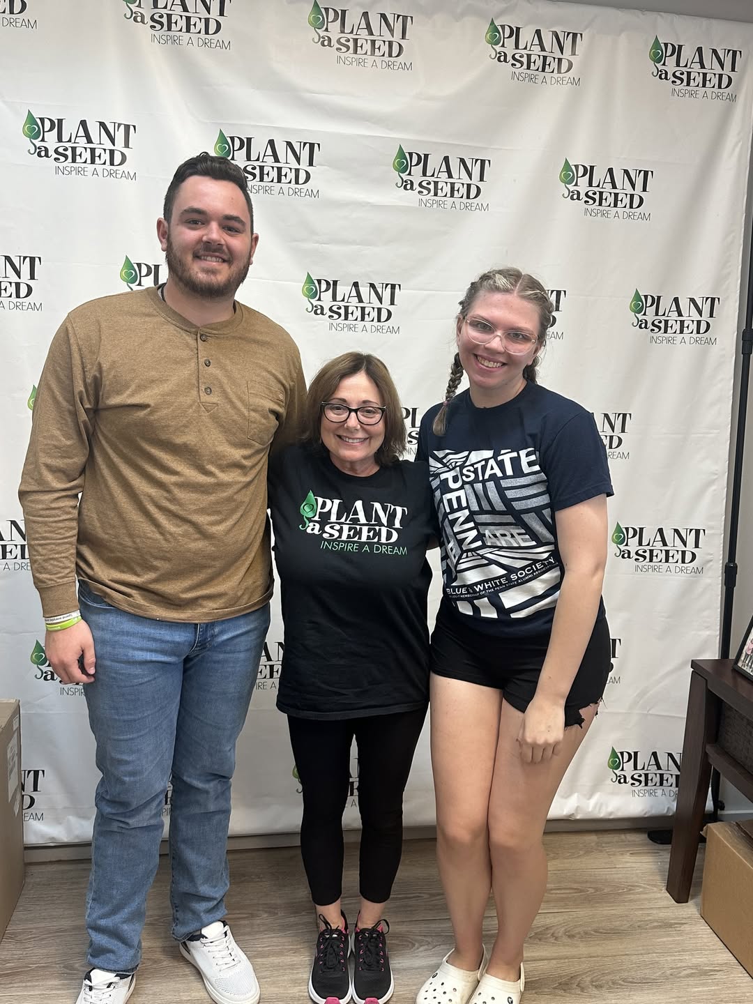 Founders Michele & Gene Rice with scholarship recipient Odin